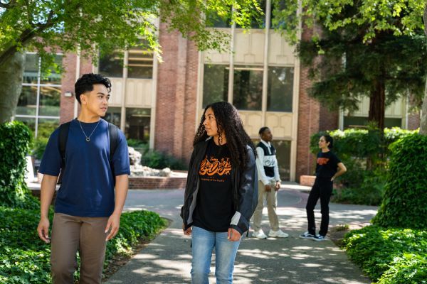 students walk on the stockton campus